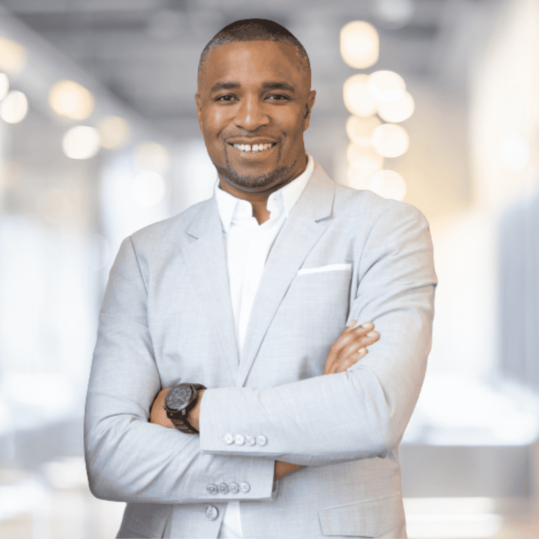 Professional real estate agent in a modern office with bright lighting.