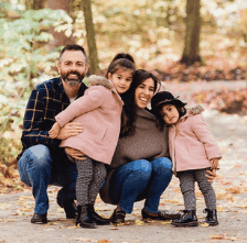 Family enjoying autumn outdoors, emphasizing home comfort and family living.